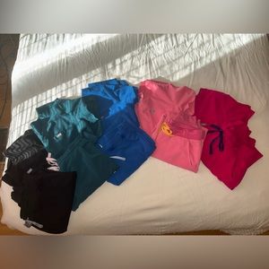 Ultra rose and Caribbean blue FIGS scrubs.